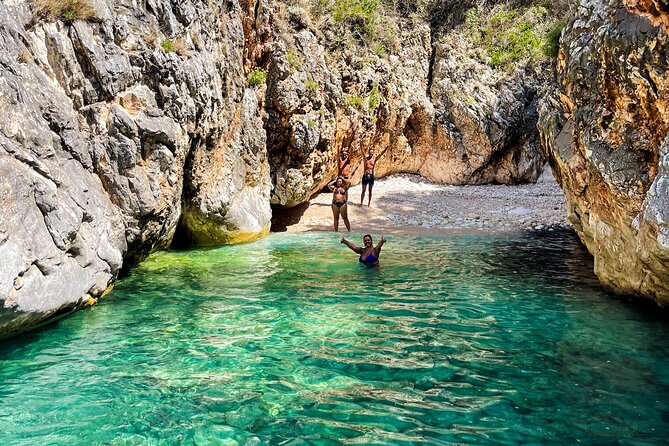 Blue Cave & Grama Bay Full Day Guided Boat Tour - Stop 2 and 3: Dafina Bay beach time and Dafina Cave underwater wonder
