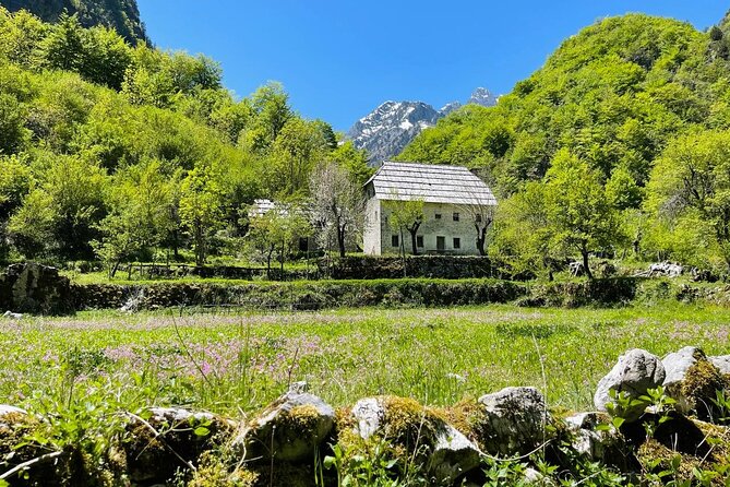 Full Day Tour to Albanian Alps Theth, Grunas Waterfall, Blue Eye - Nderlysaj natural baths: short stop, big payoff for water and photos