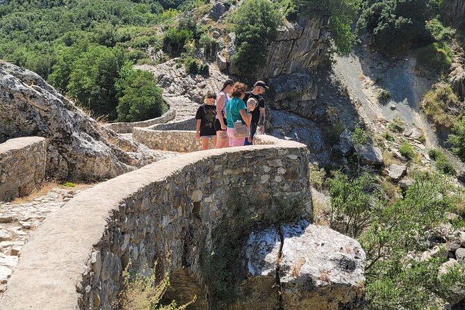 Outdoor Experience in Amantia Archeological Park & Brataj Bidge - Stop 2: Lepenicë village and the written cave with 3 millennia BC paint