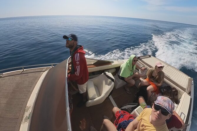 Private Half Day Boat Sazani Island & Haxhi Aliu Cave - Western Sazan cliffs and caves: stunning views, brief window