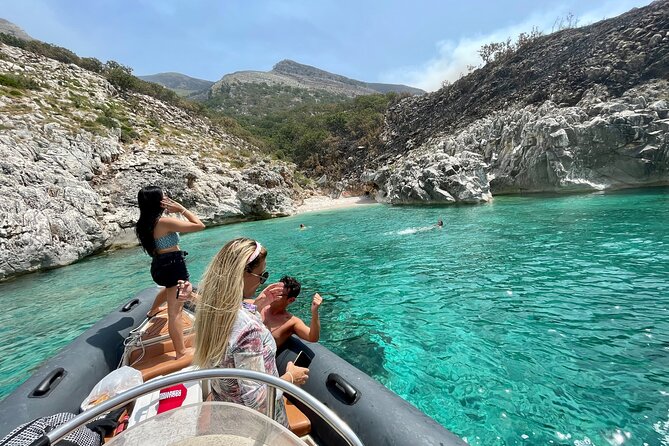 Secret Blue Gem Cave & Grama Bay Boat Tours Vlore - Haxhi Ali Cave run: fast sea time, dolphins, and untouched-feeling bays