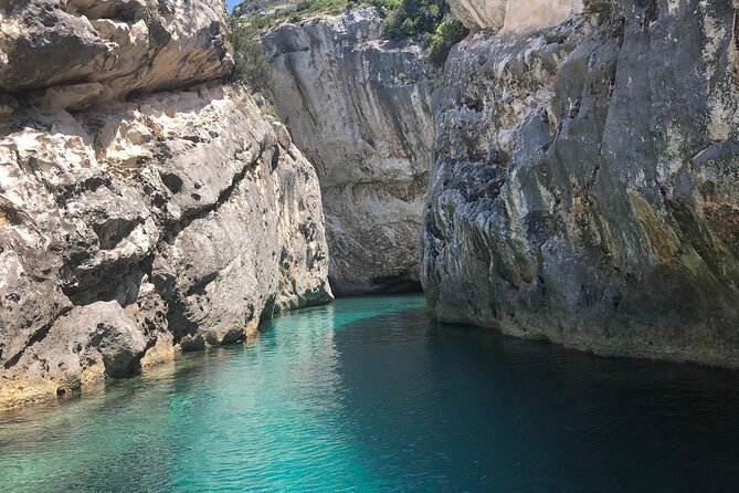 Secret Blue Gem Cave & Grama Bay Boat Tours Vlore - Crew energy, music, and the on-board food and drink plan
