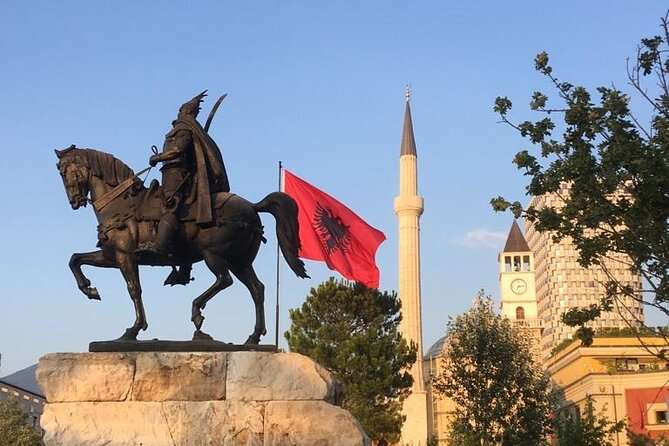 Tirana Express Walking Tour - Essential of the Albanian Capital - Deshmoret E Kombit Boulevard, seeing government history at walking speed