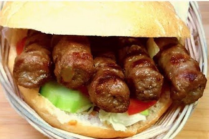 Tirana Guided Street Food Gems Tour (6 dishes, 1 sweet and drink) - Sheshi Skënderbej on a food route, not a museum route
